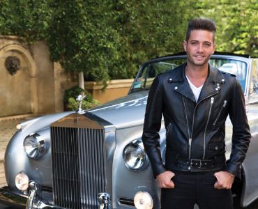 Photo of Joshua Daniel Flagg with his car.